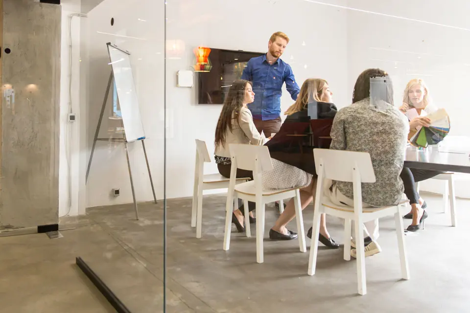 A business team meeting around a table